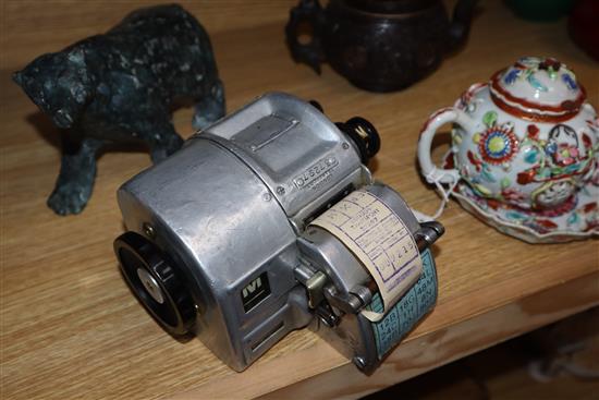 A Gibson A14 London bus ticket machine and a Swedish AB Almex ticket machine, both in fitted leather cases